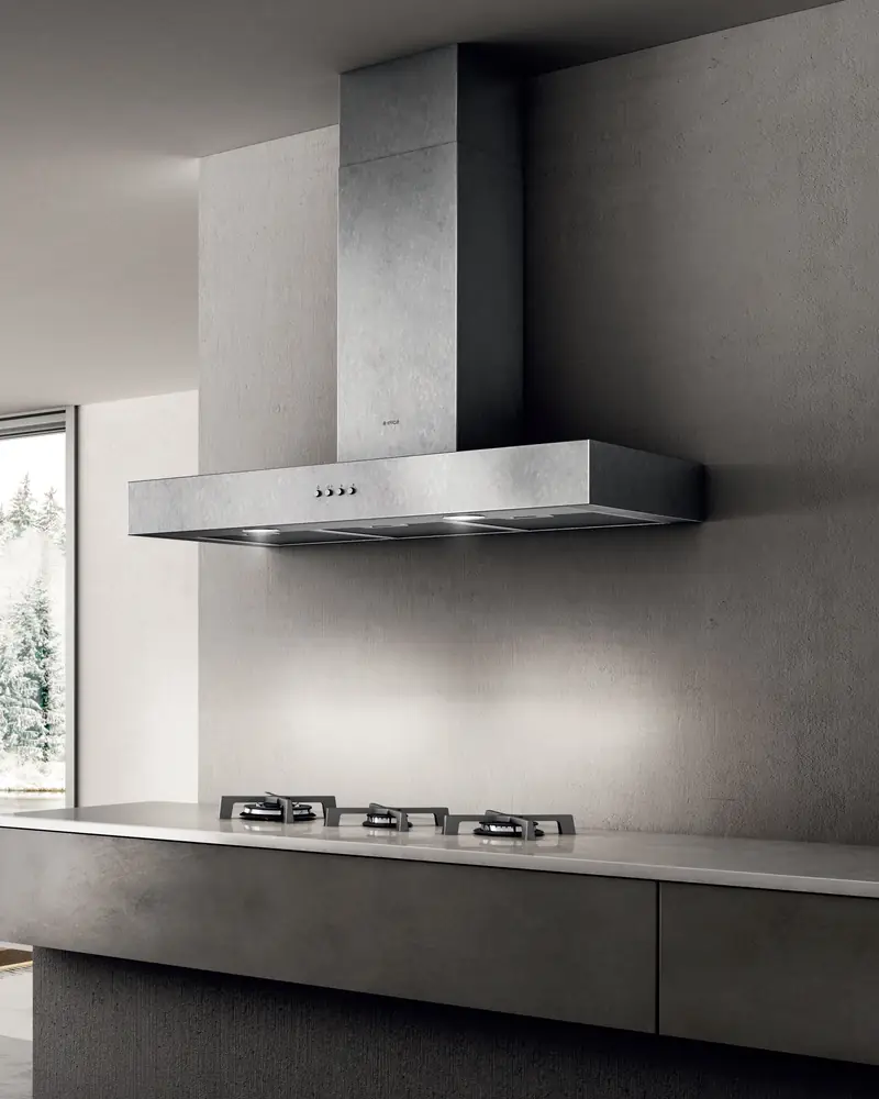 Elica chimney hood over a gas hob